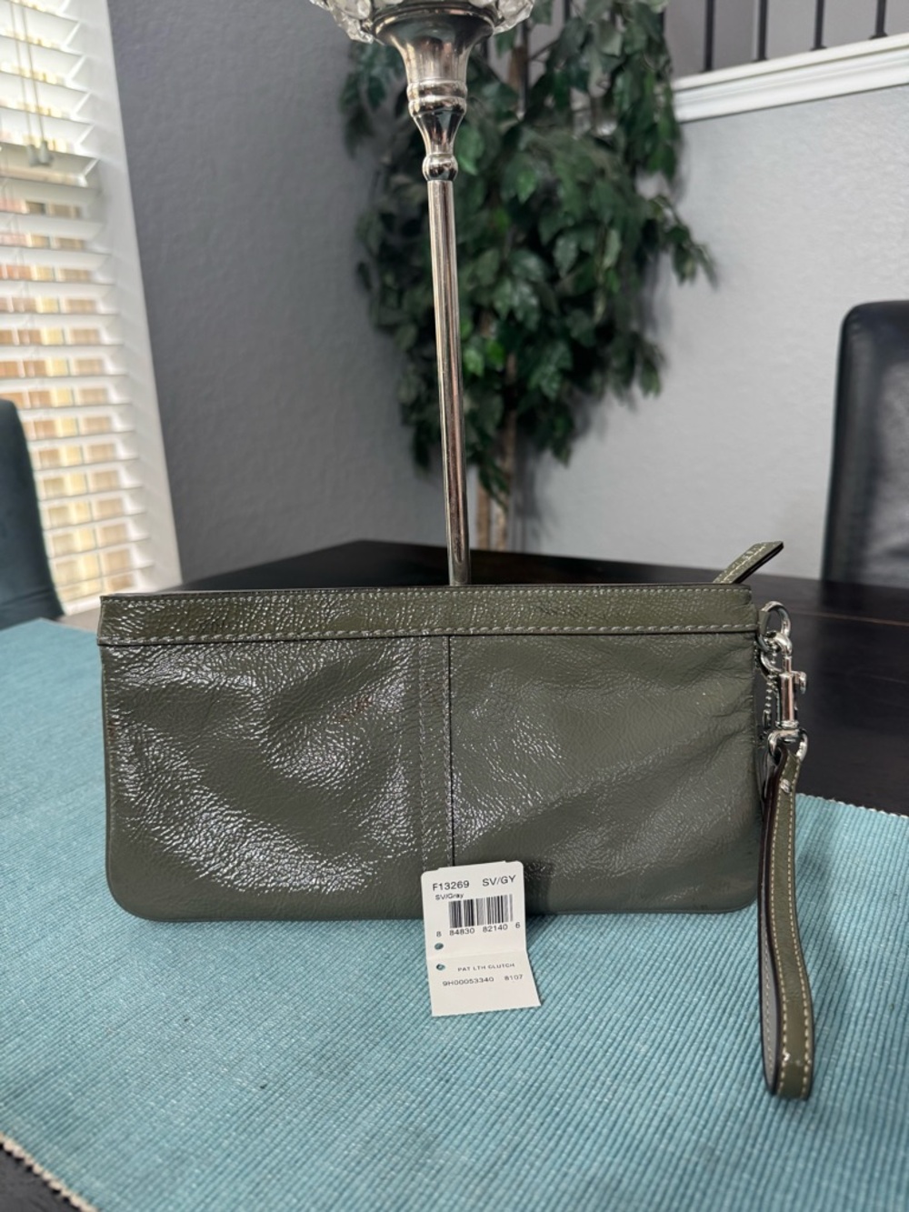 Coach patent leather grey wristlet clutch